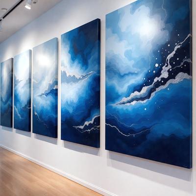 The primary subject of the image is a painting of a blue ocean. The painting is displayed on a white wall, which serves as the setting. The visual style of the painting is a mix of digital art and illustration, creating a unique and artistic representation of the ocean. The dominant colors in the painting are blue and white, giving the scene a serene and calming atmosphere.